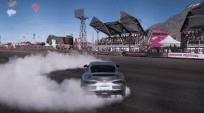 A Car Is Drifting On A Track That Says Horizon Festival On It GIF