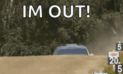 A Car Is Driving Down A Dirt Road With The Words `` Im Out '' Written On The Bottom . GIF
