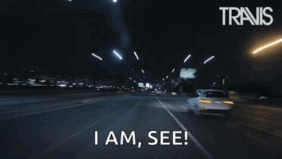 A Car Is Driving Down A Highway At Night And Says I Am See . GIF