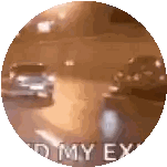 A Car Is Driving Down A Highway At Night With The Words `` My Ex '' Written On The Bottom . Sticker