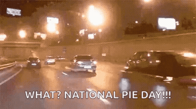 A Car Is Driving Down A Highway At Night With The Words `` What ? National Pie Day !! '' GIF
