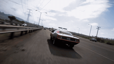 A Car Is Driving Down A Highway With A License Plate That Says ' Sd ' On It GIF