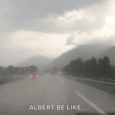 A Car Is Driving Down A Highway With The Words Albert Be Like Below It GIF