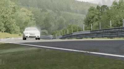 A Car Is Driving Down A Road With Trees On The Side GIF