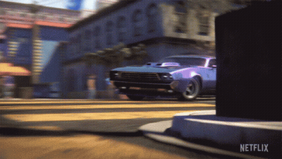 A Car Is Driving Down A Street With Netflix Written On The Bottom GIF