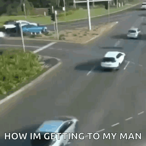 A Car Is Driving Down A Street With The Words How Im Getting To My Man On The Bottom GIF