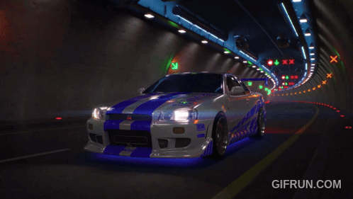 A Car Is Driving Down A Tunnel With A Sign That Says 40 GIF