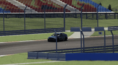 A Car Is Driving On A Race Track With A Fence And A Sign That Says 30 GIF