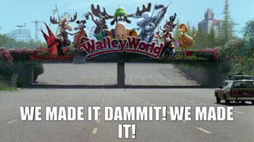 A Car Is Driving Past A Sign That Says Walley World GIF
