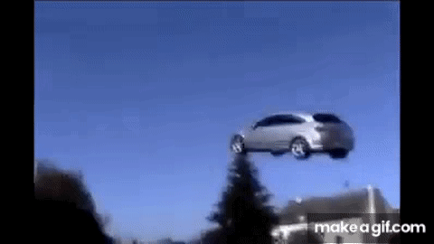 A Car Is Flying Through The Air On Make A Gif . GIF