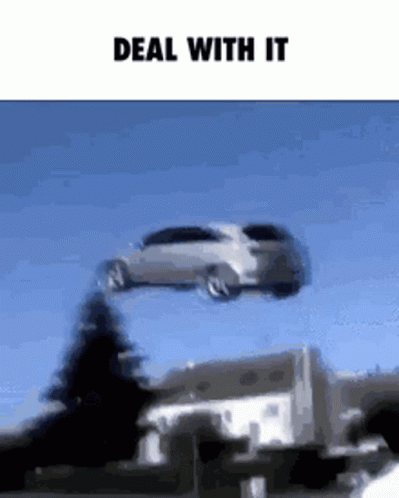 A Car Is Flying Through The Air With The Words Deal With It Below It . GIF