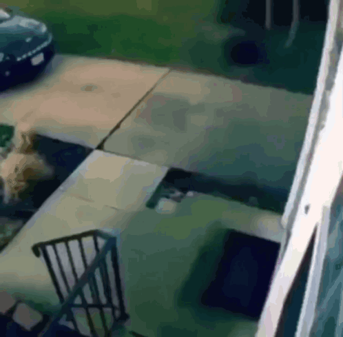 A Car Is Parked On The Side Of The Road Next To A Staircase GIF