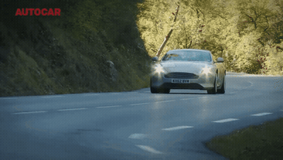 A Car With A License Plate That Says Kx82 Bvm GIF