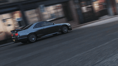 A Car With A New York License Plate Is Driving Down The Street GIF