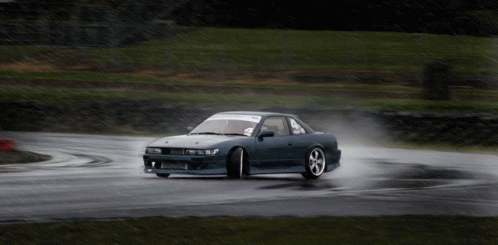A Car With A Sticker On The Windshield That Says ' Nissan ' GIF