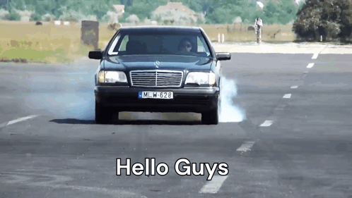 A Car With The License Plate Mlw 628 Is Driving Down A Road GIF