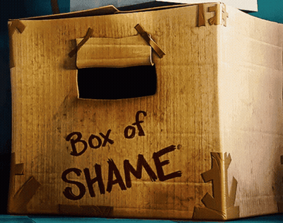 A Cardboard Box That Says Box Of Shame GIF