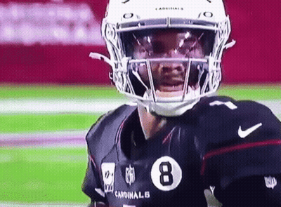 A Cardinals Football Player Wearing A Helmet And A Jersey With The Number 8 On It GIF