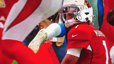 A Cardinals Football Player Wearing A Red Jersey With The Number 1 On It GIF