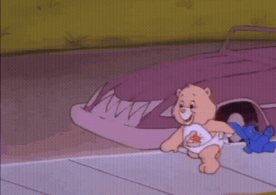 A Care Bear Holding A Blue Teddy Bear In Front Of A Car GIF
