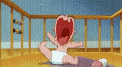A Cartoon Baby Is Crying In A Crib . GIF