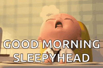 A Cartoon Baby Is Yawning And Says `` Good Morning Sleepyhead '' . GIF