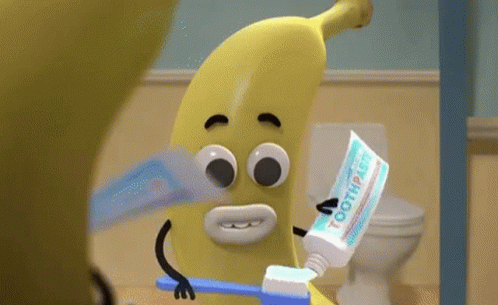 A Cartoon Banana Is Brushing Its Teeth With A Blue Toothbrush And Toothpaste . GIF