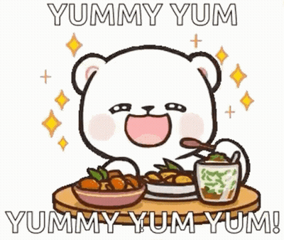 A Cartoon Bear Is Sitting At A Table Eating Food And Drinking A Cup Of Tea . GIF