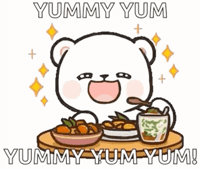 A Cartoon Bear Is Sitting At A Table Eating Food And Drinking A Cup Of Tea . GIF