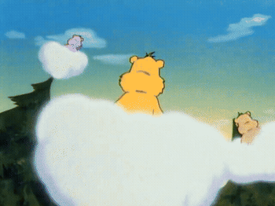 A Cartoon Bear Is Standing In The Clouds Surrounded By Other Bears GIF