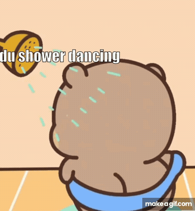 A Cartoon Bear Is Taking A Shower And Dancing GIF