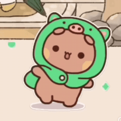 A Cartoon Bear Wearing A Green Pig Costume Is Standing On A Beach . GIF