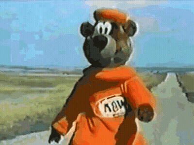 A Cartoon Bear Wearing An Orange Jacket With The Word Nov On The Back GIF