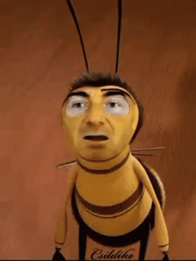 A Cartoon Bee With A Man 'S Face On It Is Looking At The Camera . GIF
