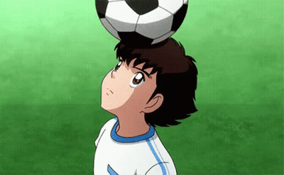 A Cartoon Boy Is Holding A Soccer Ball On His Head . GIF
