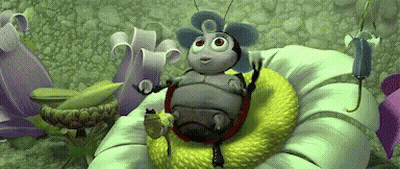 A Cartoon Bug Is Sitting On Top Of A Green Flower . GIF