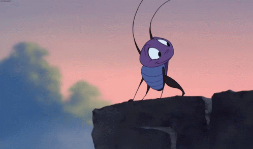 A Cartoon Bug Is Standing On A Rock With A Pink Sky Behind It GIF