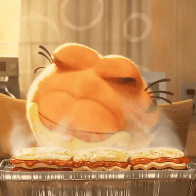 A Cartoon Cat Is Eating A Tray Of Food GIF