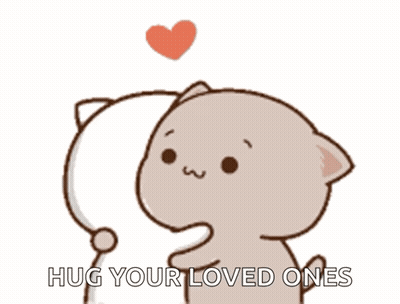 A Cartoon Cat Is Hugging Another Cat With The Words Hug Your Loved Ones GIF