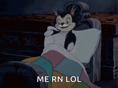 A Cartoon Cat Is Laying In A Bed With The Words Me Rn Lol Above Him GIF