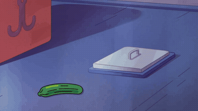 A Cartoon Cat Is Looking At A Cucumber GIF