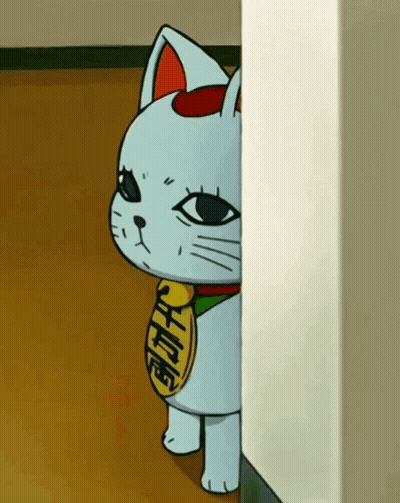 A Cartoon Cat Is Peeking Out From Behind A White Wall GIF