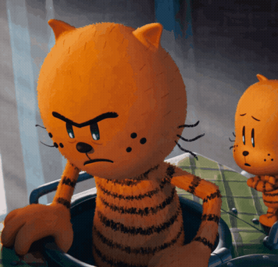 A Cartoon Cat Is Sitting In A Bucket With An Angry Look On His Face GIF