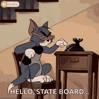 A Cartoon Cat Is Sitting In A Chair Talking On A Phone . GIF