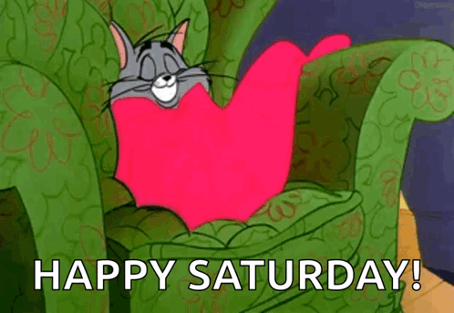 A Cartoon Cat Is Sitting In A Chair With A Heart Shaped Pillow On Its Back . GIF