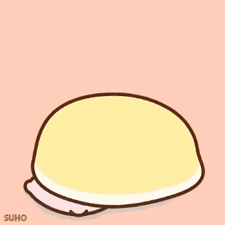 A Cartoon Cat Is Sitting On A Bed With A Pillow And Blanket . GIF
