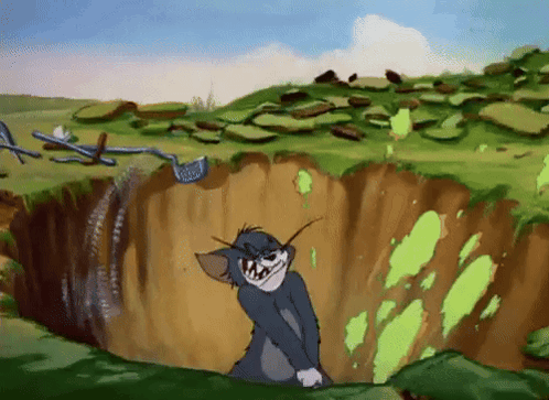 A Cartoon Cat Is Standing In A Hole With A Golf Club In His Mouth GIF