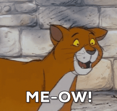 A Cartoon Cat Is Standing In Front Of A Brick Wall And Says Me-Ow ! GIF