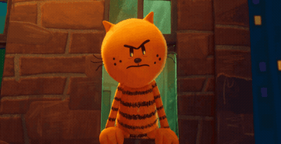 A Cartoon Cat Is Standing In Front Of A Brick Wall With An Angry Face GIF