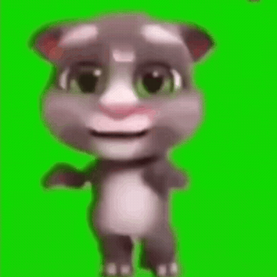 A Cartoon Cat Is Standing On A Green Screen And Smiling . GIF